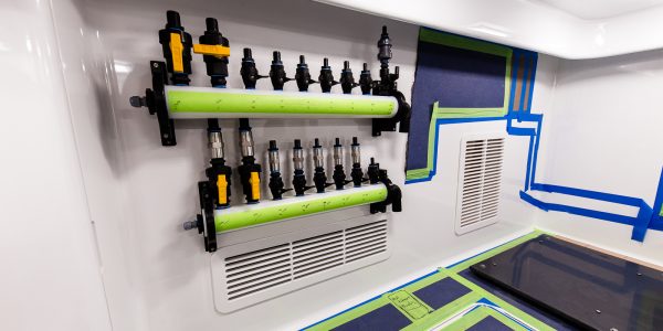 Heat exchanger supply/return manifold installed