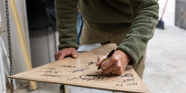 Whiskey plank signing