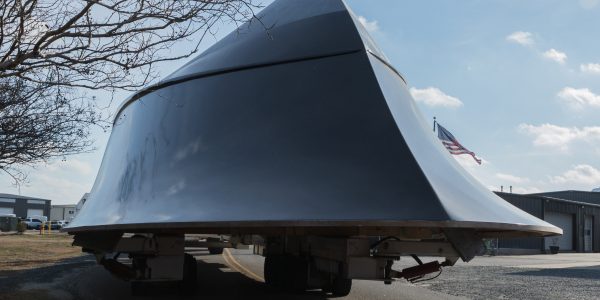 Hull being moved outside