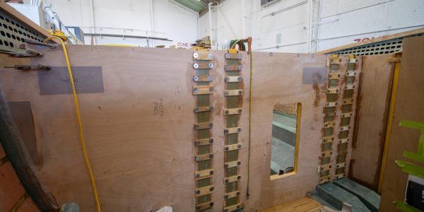 Bulkheads with drain tubes. 